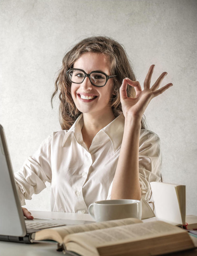 Woman showing success sign with fingers